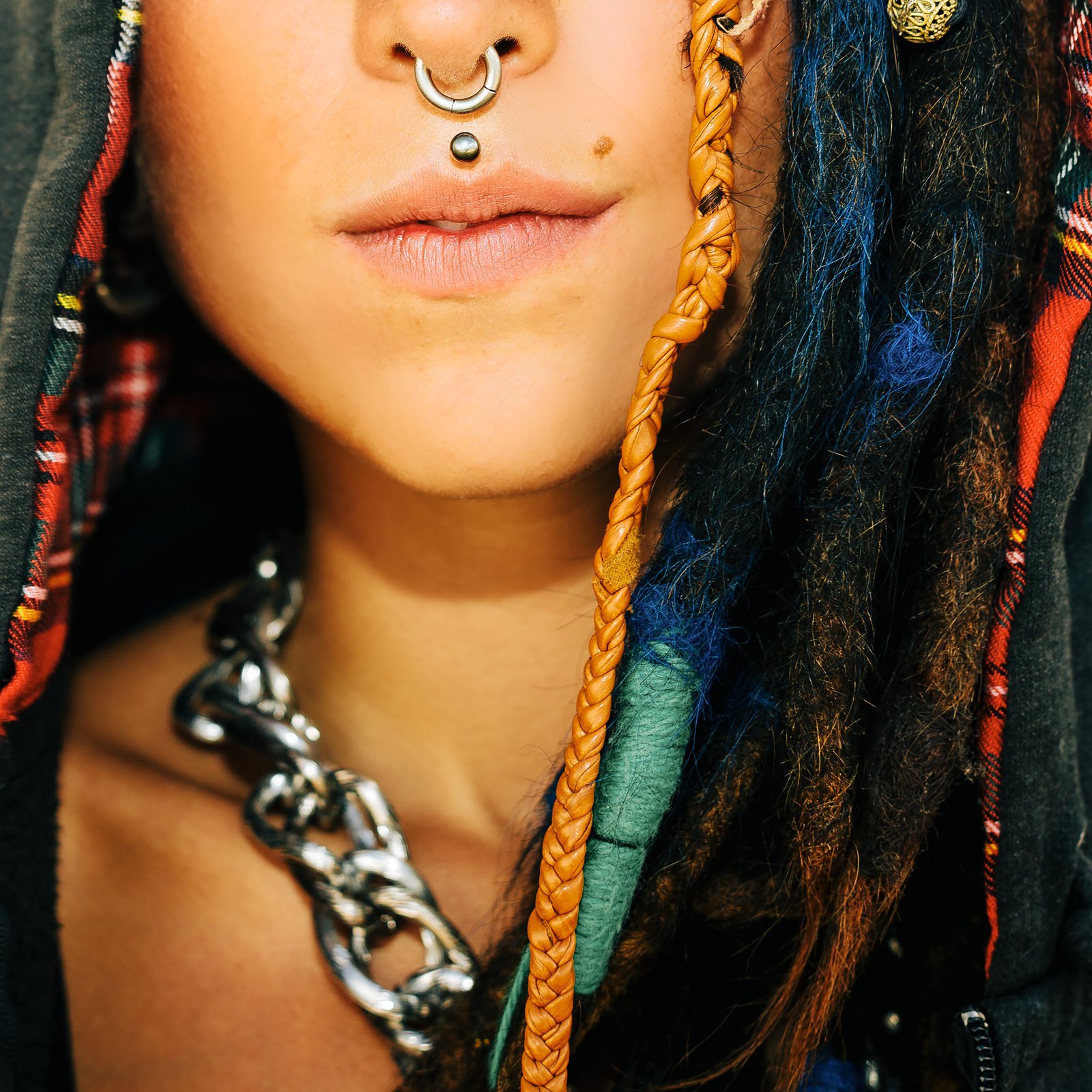 Girl with Dreadlocks and Piercings 