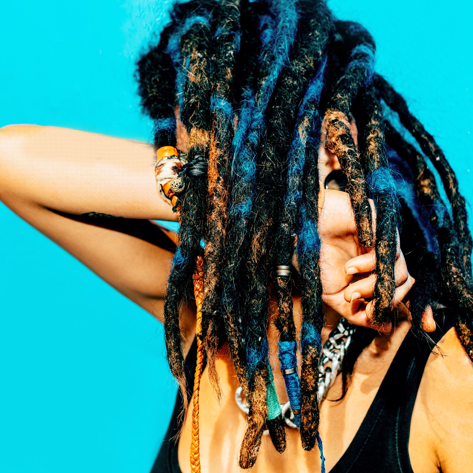 Rasta Latino Girl with Dreadlocks and Piercings 